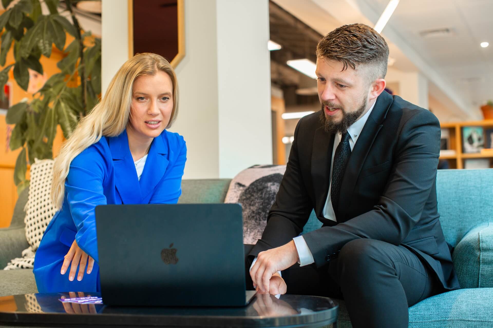 Loredana Principessa reviewing lead generation and conversion strategy with a colleague